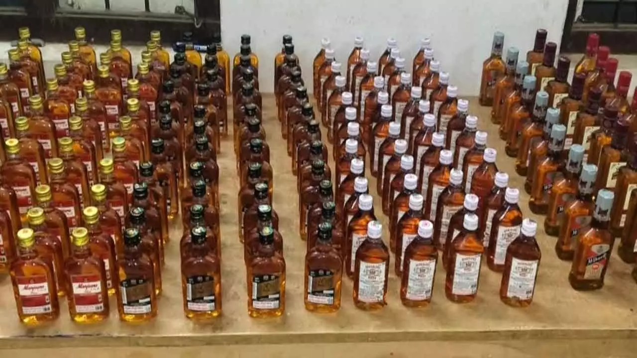 Mangapet belt shops receiving illegal liquor from neighboring mandals; Excise officials take strict action, register multiple cases.