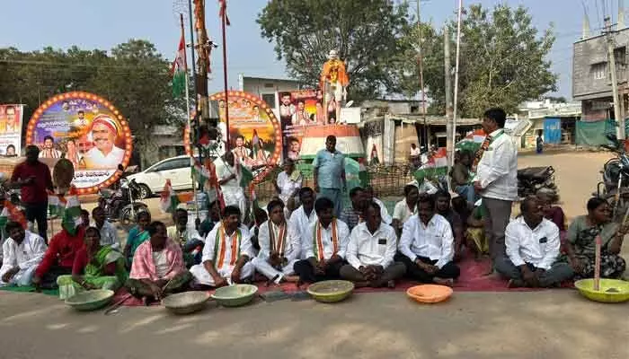 Wanaparthy villagers protested against MNREGS scheme changes, including name alteration and reduction in worker wages.